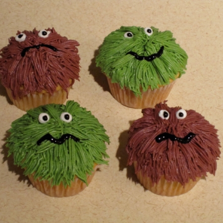 Four Monster cupcakes