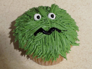 A close up of a monster cupcake
