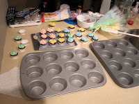 Cupcakes pans about to be filled.