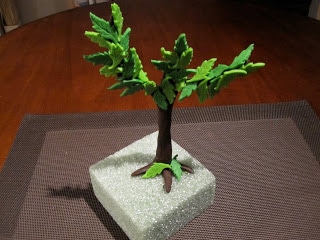 Fondant tree with leaves attached.