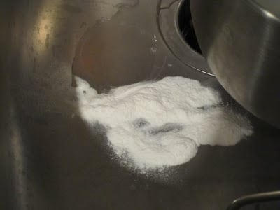 A close up of tylose powder spilled in the sink.