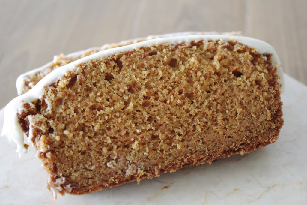 Close up of a slice of carrot loaf.