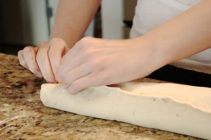 Pinch dough seam to seal