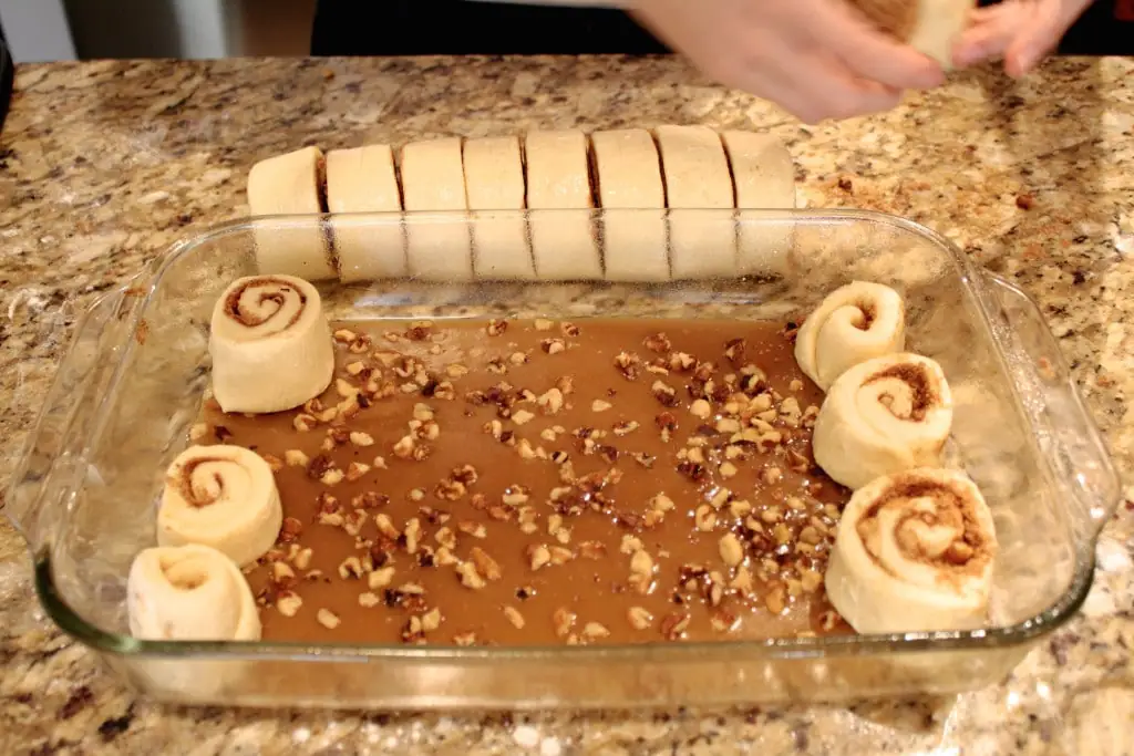 Place rolls on top of caramel