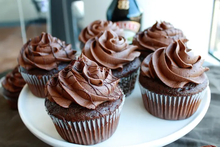 Chocolate cupcakes on a table.