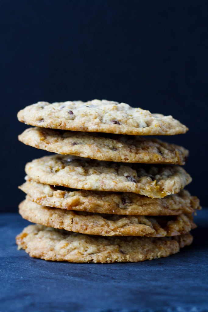 A stack of cookies on a dark background.