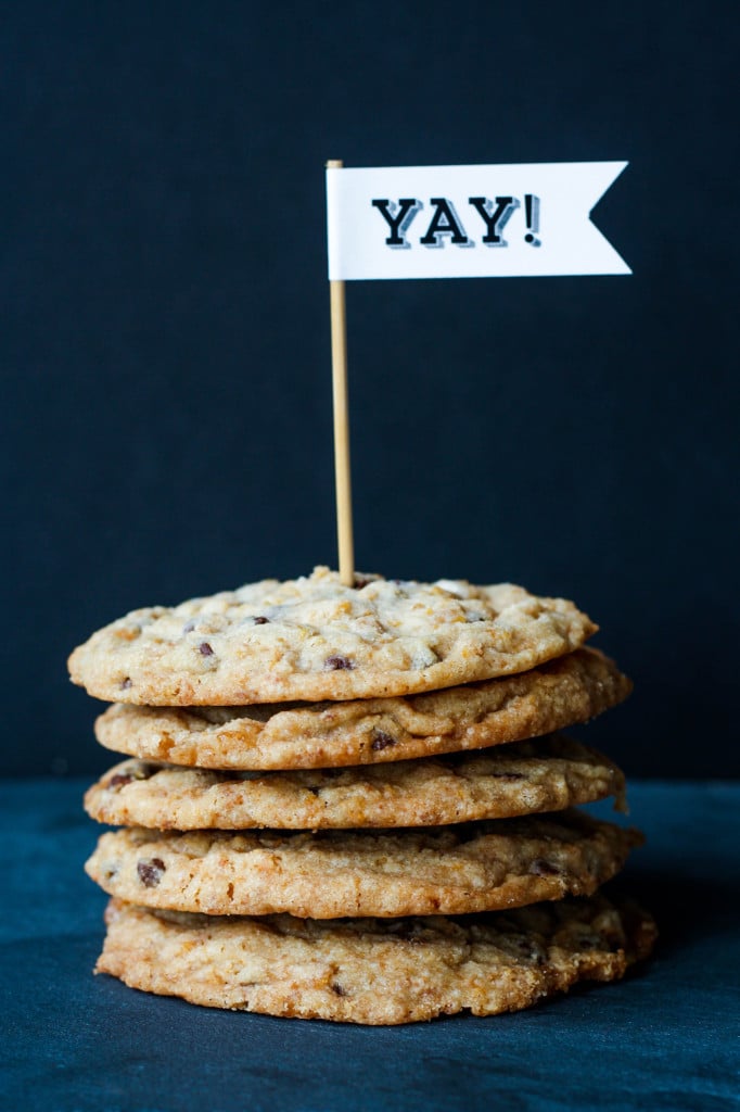 A stack of cookies on a dark background.