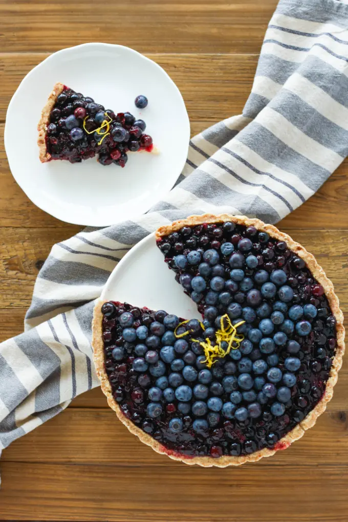 Overhead shot of the tart with a slice cut out