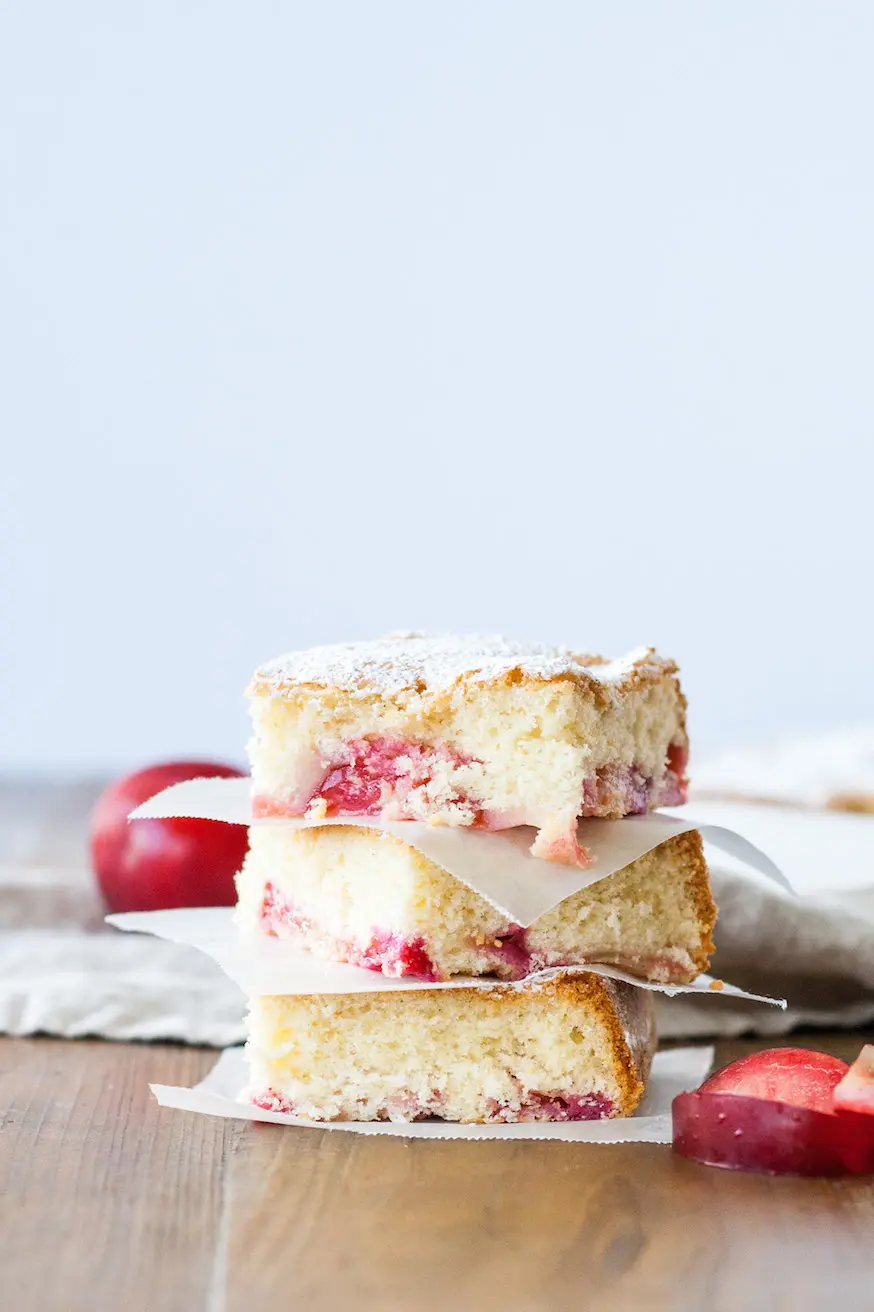 Squares of cake stacked on each other.