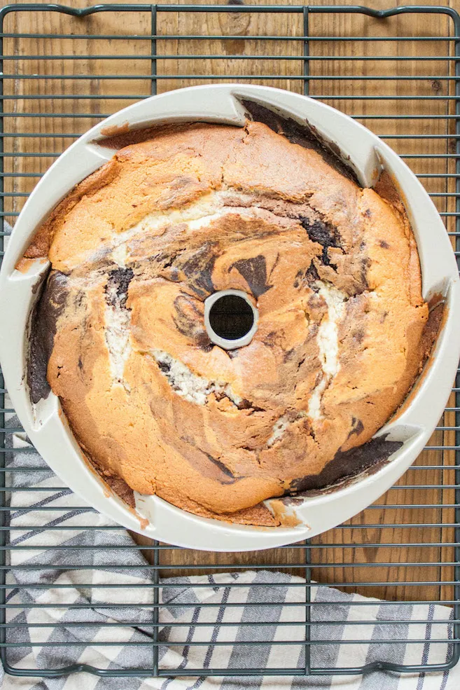 Overhead shot of the baked cake in a pan.