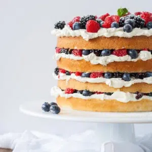 Cake on a white cake stand.