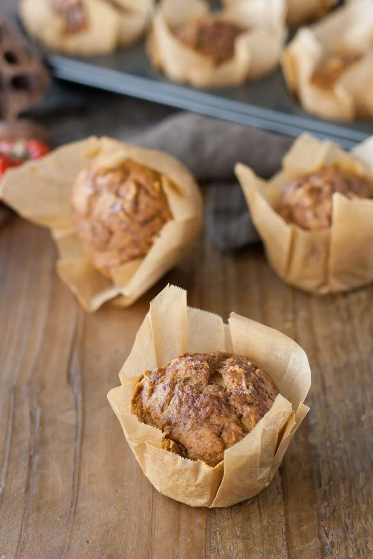 Muffins on a wooden table.