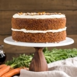 Spiced carrot cake layers infused with maple syrup and topped with maple caramel & cream cheese frosting. | livforcake.com