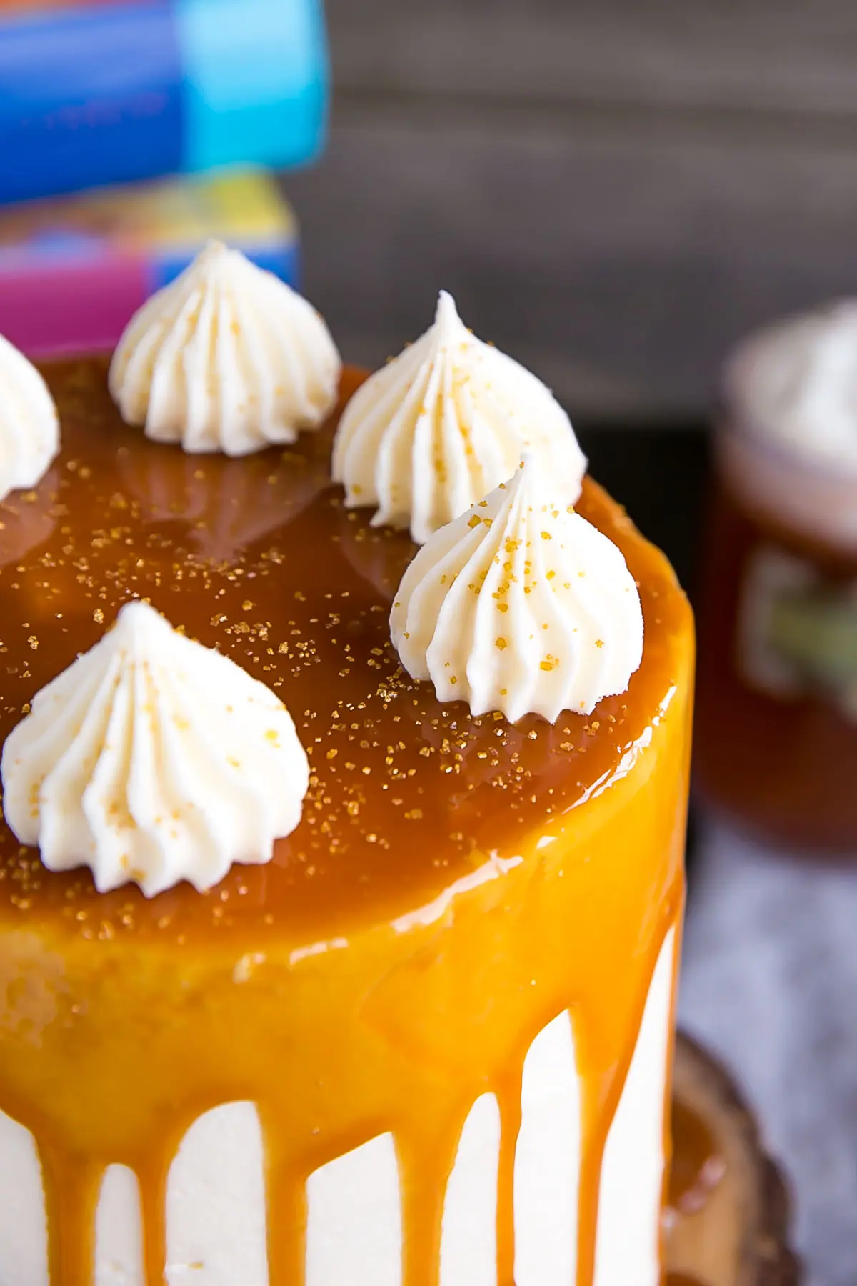 Close up of dollops on this Butterbeer Cake.