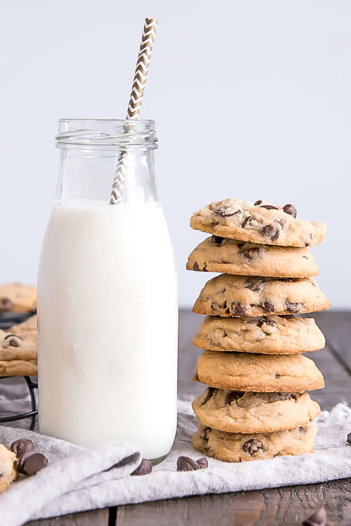 Stack of cookies by a glass of milk