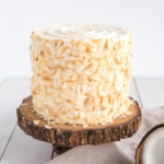 A coconut cake sitting on top of a table