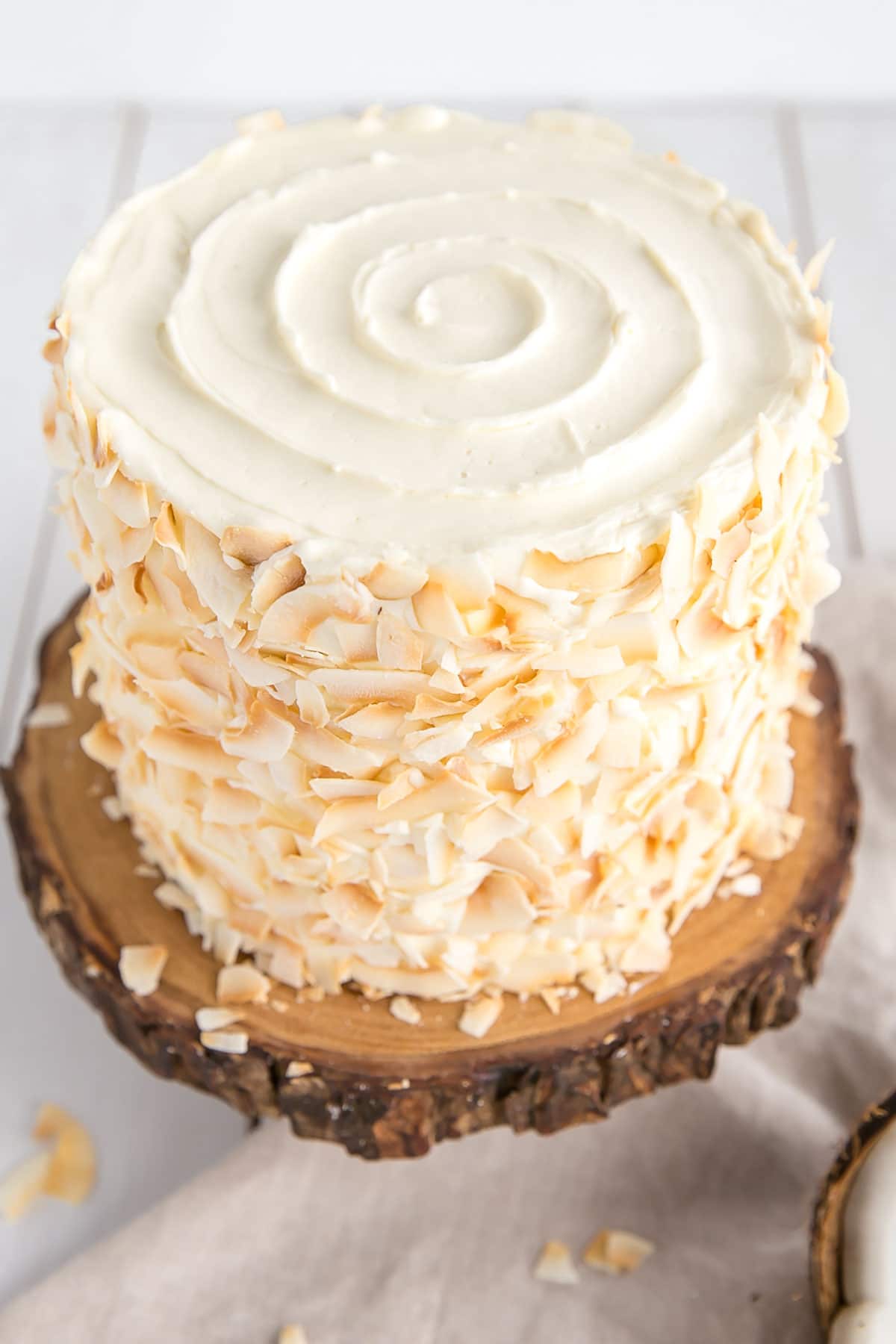 Shot of the top of the cake showing a buttercream swirl.
