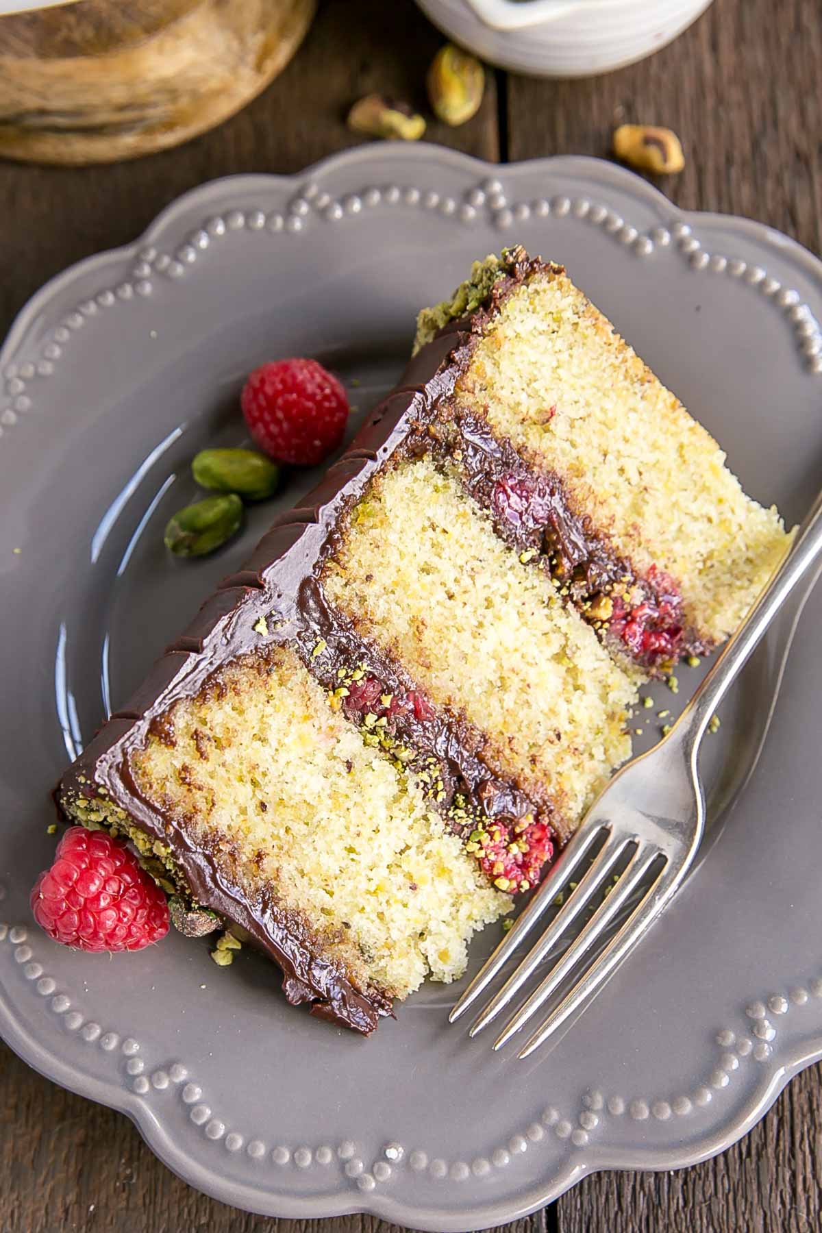 Dark chocolate pistachio layer cake with buttercream frosting.