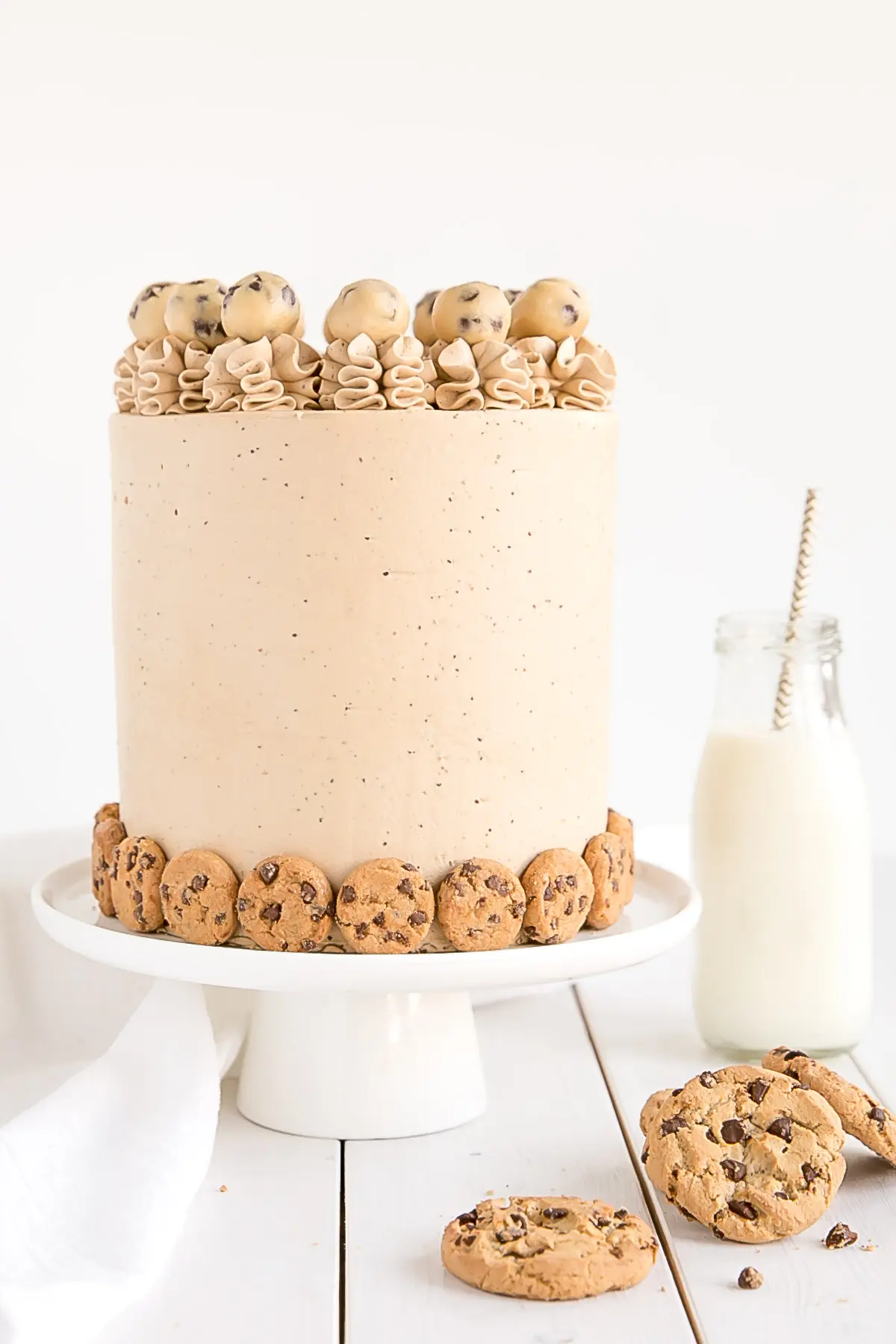 A cookie lovers dream! Chocolate Chip Cookie Cake with cookie dough filling and cookie frosting.