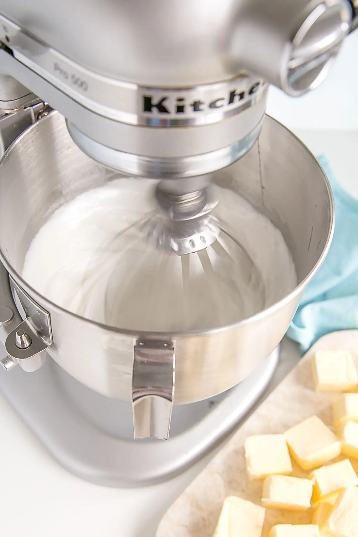 Meringue whipping in a stand mixer.