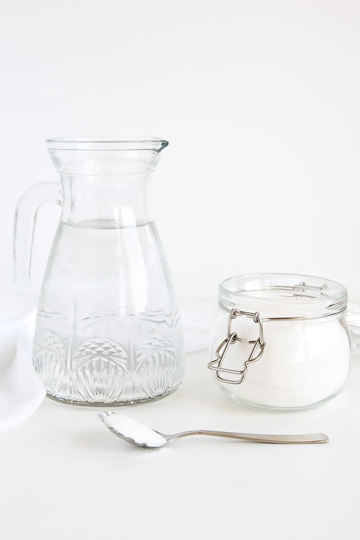Make simple syrup by briefly cooking a sugar and water mixture.
