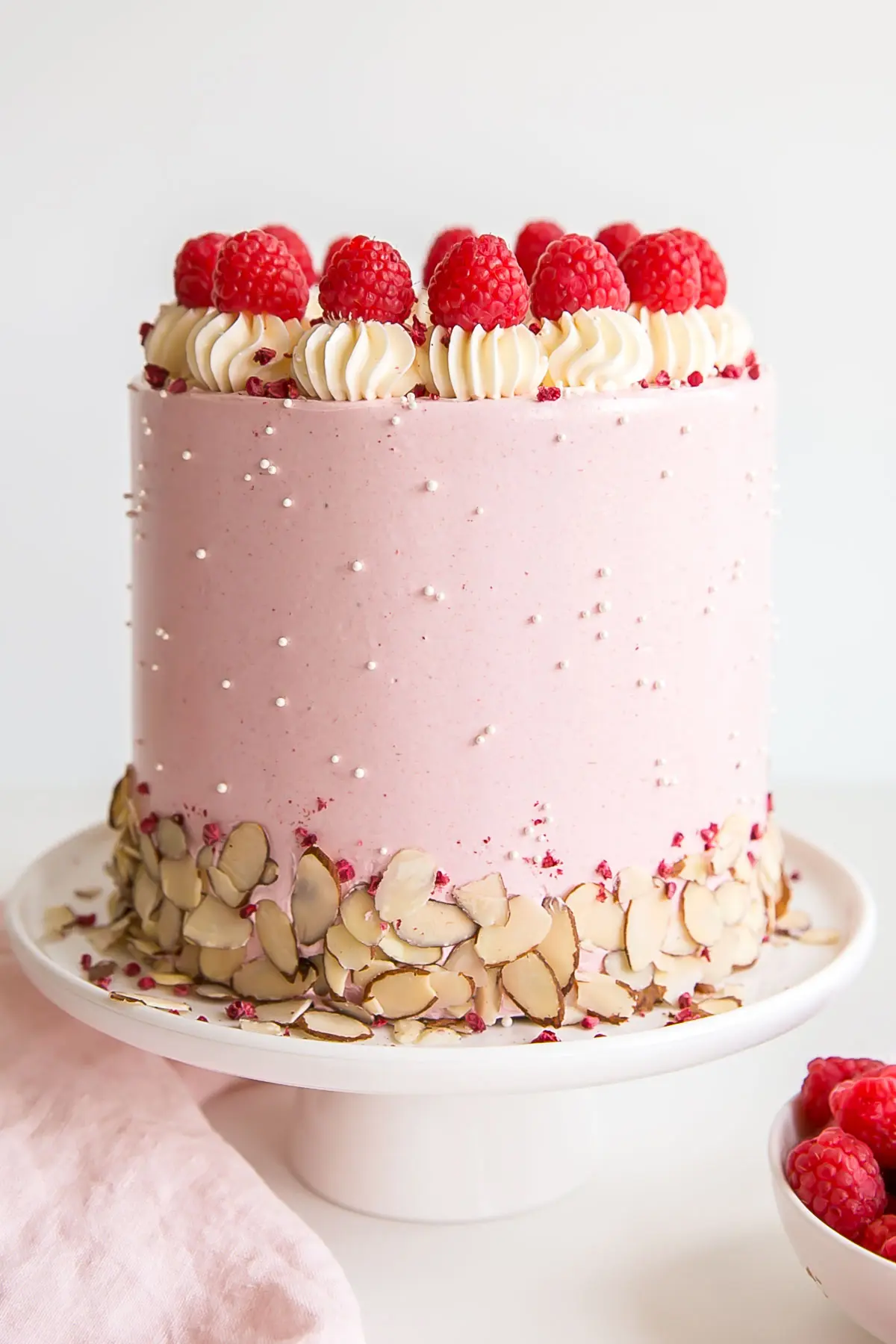 Raspberry Almond Cake with raspberry frosting.