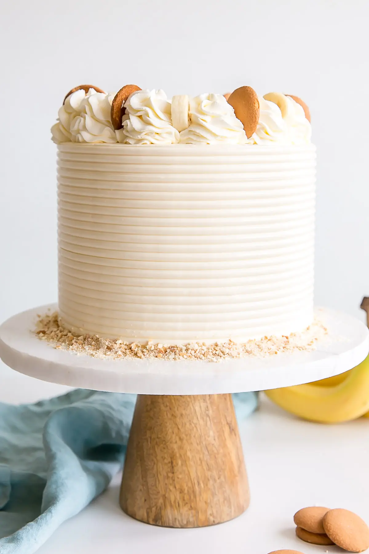 Banana Pudding Cake with vanilla frosting and whipped cream.