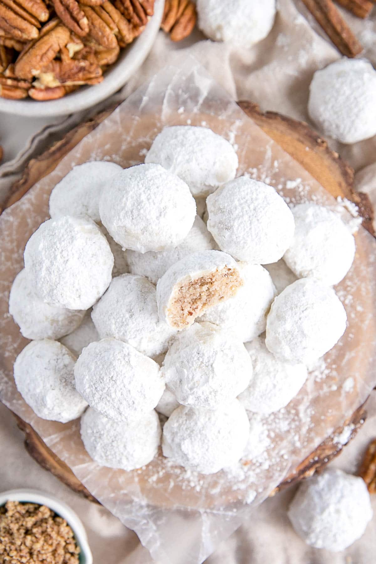 Overhead photo of the stacked snowball cookies on a plate.