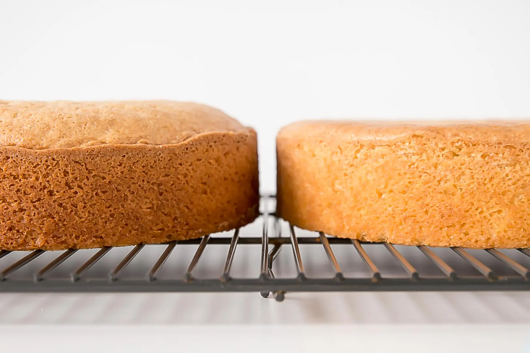 Baking a tall cake in a regular pan - Seasoned Advice