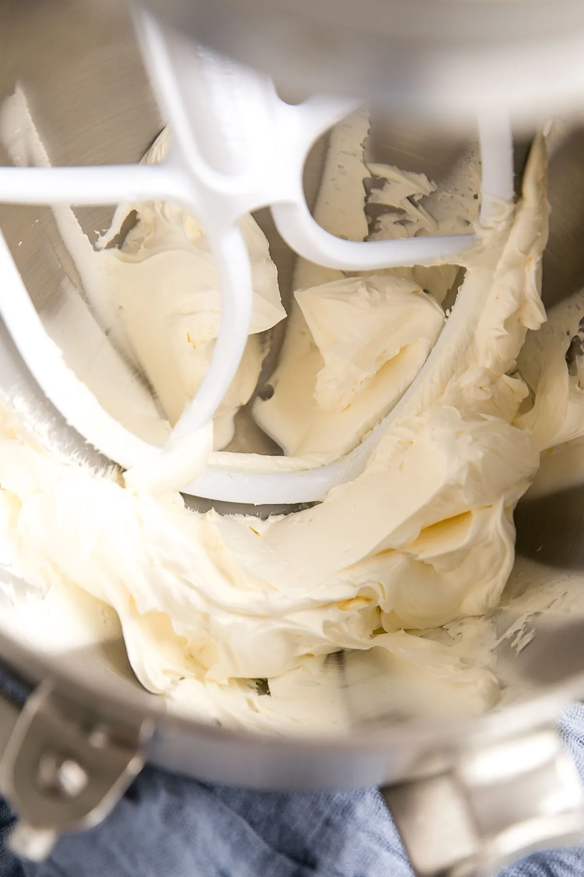 Whipped butter in a mixer bowl.